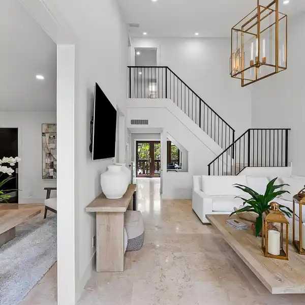 MODERN COASTAL ESCAPE STEPS FROM THE SAND