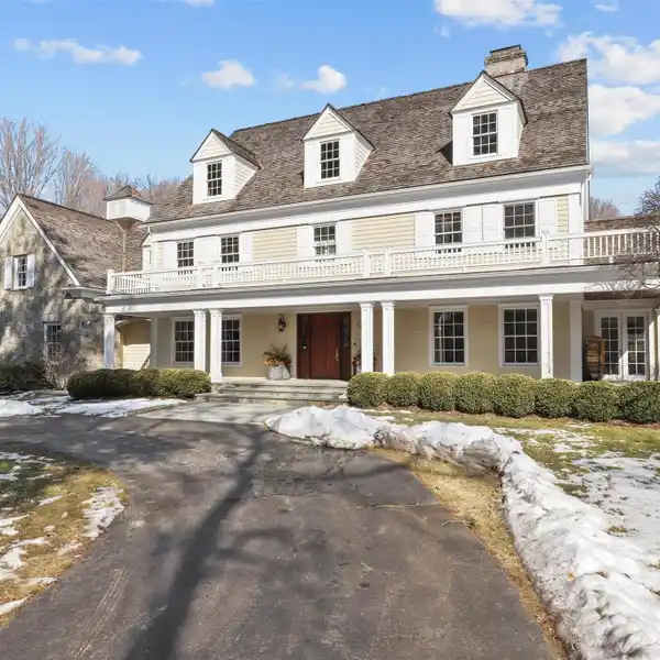 EXTENSIVELY UPDATED CENTER HALL COLONIAL IN THE HEART OF POUND RIDGE