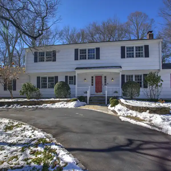 TIMELESS COLONIAL HOME ON A QUIET CORNER LOT