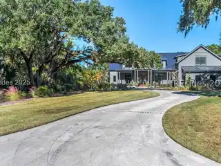 Serene Marshfront Haven with Elegant Outdoor Living