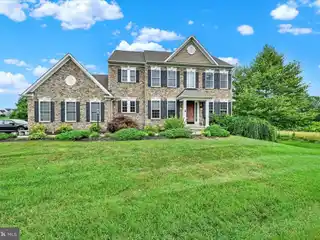 Stunning Stone Colonial with Open-Concept Living
