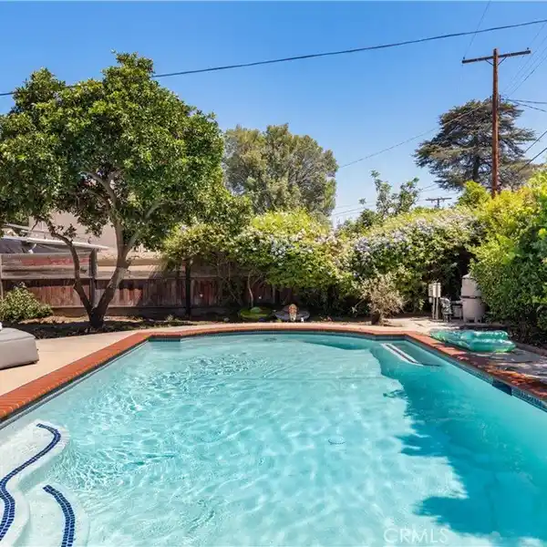 STYLISH SINGLE-FAMILY HOME WITH BACKYARD OASIS