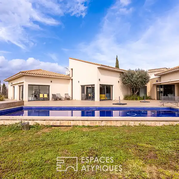 MEDITERRANEAN ELEGANCE IN A SERENE GREEN SETTING