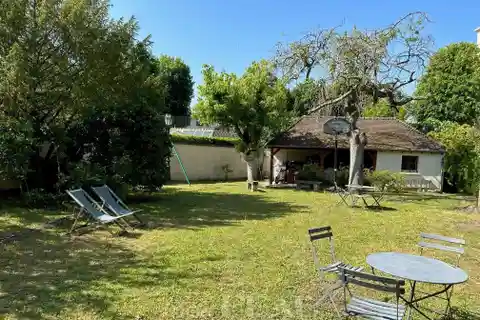 Elegant Century Home with Garden Oasis