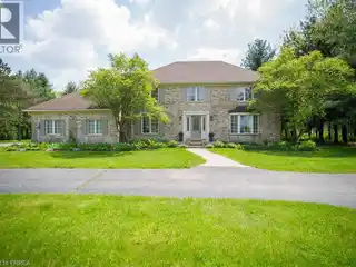 Elegant Georgian Estate on Expansive Ravine Lot