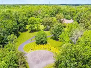 Stunning Six Bedroom Home on Ten Private Acres
