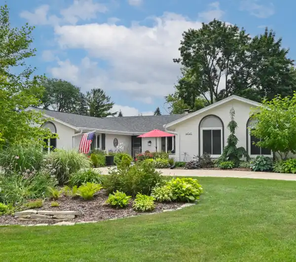 SUNLIT RANCH WITH WALKOUT LOWER LEVEL