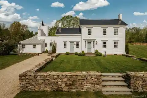 Exceptional Greek Revival Farmhouse Reimagined