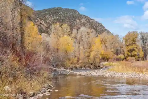 Rare Riverfront Estate Lot with Scenic Views