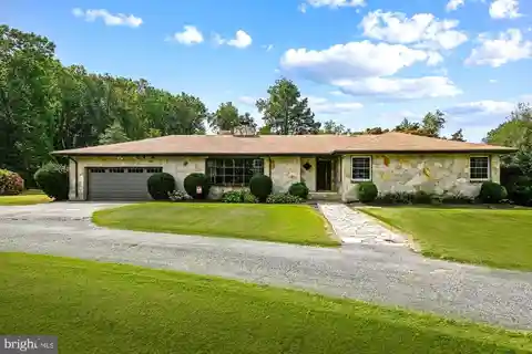 Rancher with Detached Apartment on Nearly Four Acres