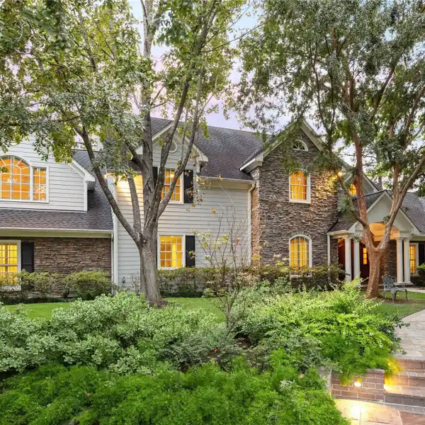 EXCEPTIONAL HOME ON A HEAVILY WOODED LOT