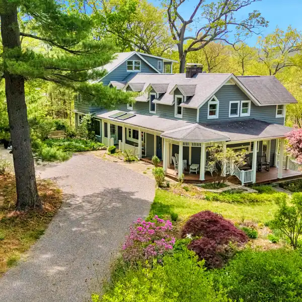 GRACIOUS HOME WITH SWEEPING RIVER VIEWS FROM EVERY ROOM