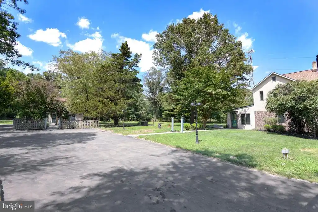 House Plus a Renovated Cottage on Nearly Four Acres