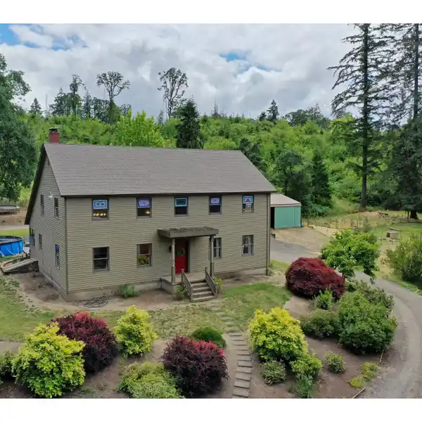 PICTURESQUE 76+ ACRE FARM THAT OFFERS A SPRAWLING 1980 FARMHOUSE