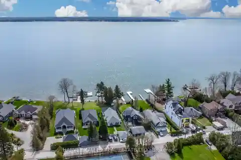 Sandy Shoreline Retreat with Breathtaking Lake Views