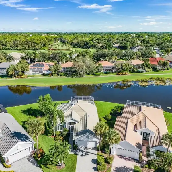 LAKEFRONT LIVING WITH IMMEDIATE GOLF ACCESS
