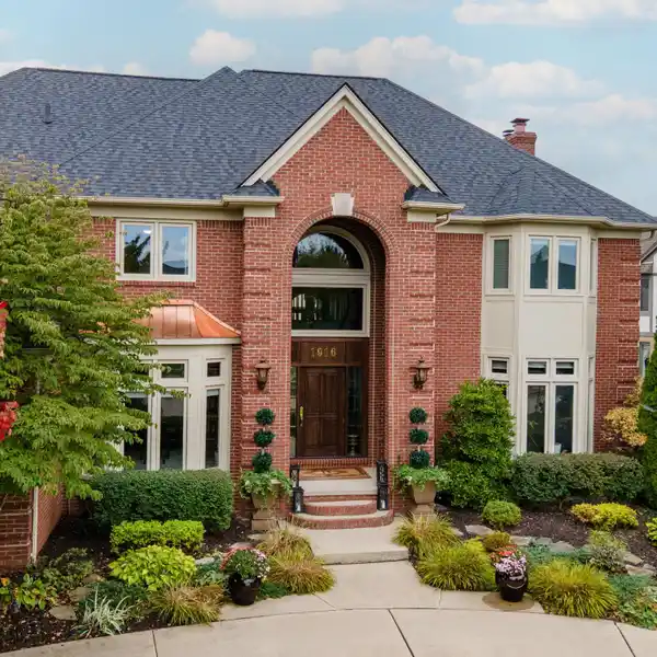 STUNNING EAST-FACING HOME IN TROY’S SOUGHT-AFTER BEACH FOREST