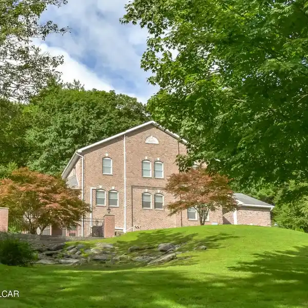 SPACIOUS BRICK RESIDENCE ON OVER FOUR ACRES