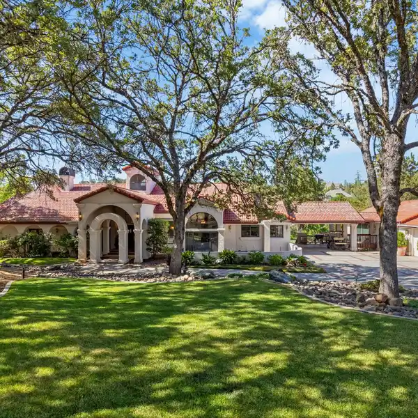 SPANISH-STYLE ESTATE WITH POND