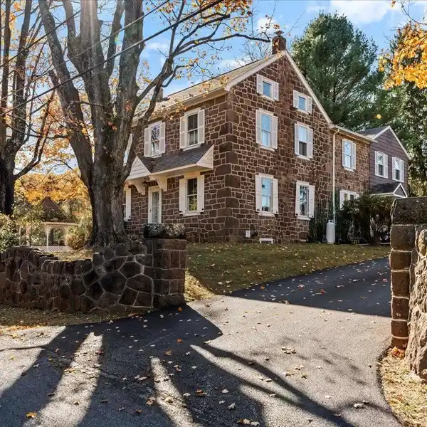 HISTORIC STONE FARMHOUSE WITH POND AND BARN