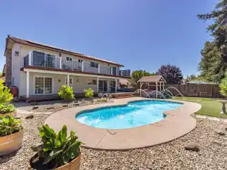 Beautifully Appointed Residence Offering Suburban Charm