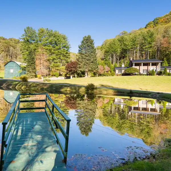 METICULOUSLY MAINTAINED HOME ON OVER 21 ACRES