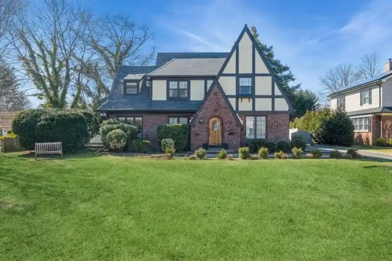 Cathedral Gardens Stately Tudor Style Home
