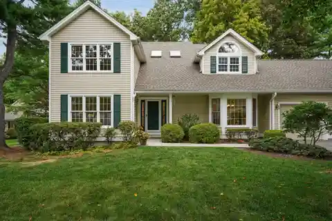 Elegant End-Unit in Prestigious Riverwoods Community