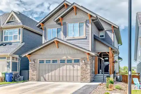 Beautifully Upgraded Home Along the Bow River