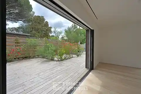 Contemporary Gem with Solarium and Garden Views