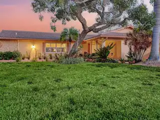 Classic Canal-Front Masonry Beach Home