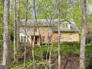 Grand Colonial on Private Hilltop Lot