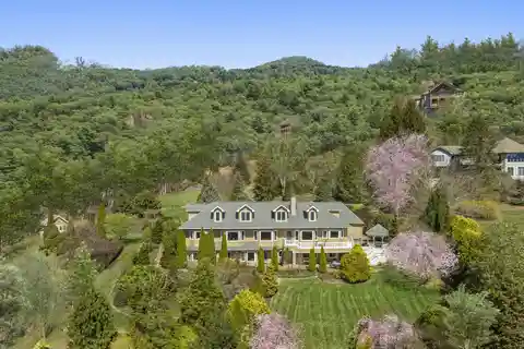 Exquisite English-style Country Estate Overlooking Laurel Ridge Country Club
