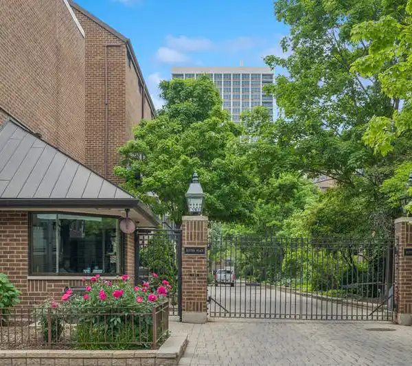 SUTTON PLACE TOWNHOME WITH TWO PRIVATE OUTDOOR SPACES