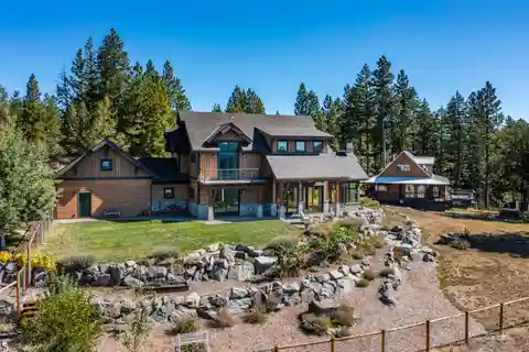 Two Homes on 100-Plus Private Acres