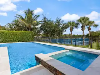 Modern Comfort Meets Waterfront Pool Paradise