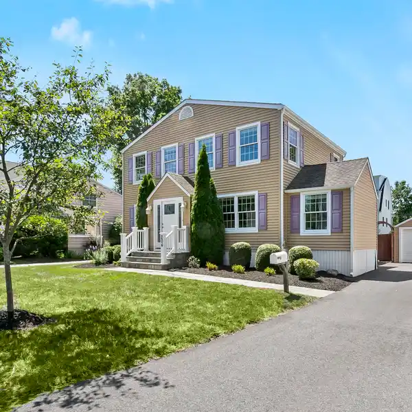 SPACIOUS COLONIAL IN COVETED BEACH NEIGHBORHOOD