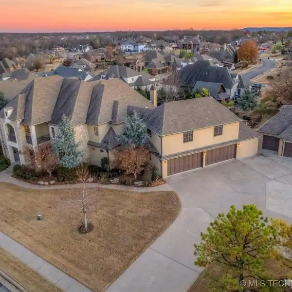 CUSTOM ESTATE IN A DESIRABLE GATED NEIGHBORHOOD