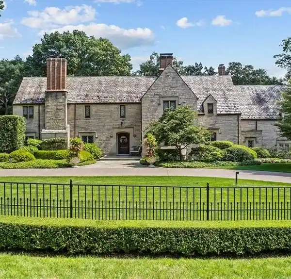 METICULOUSLY RENOVATED STONE TUDOR HOME