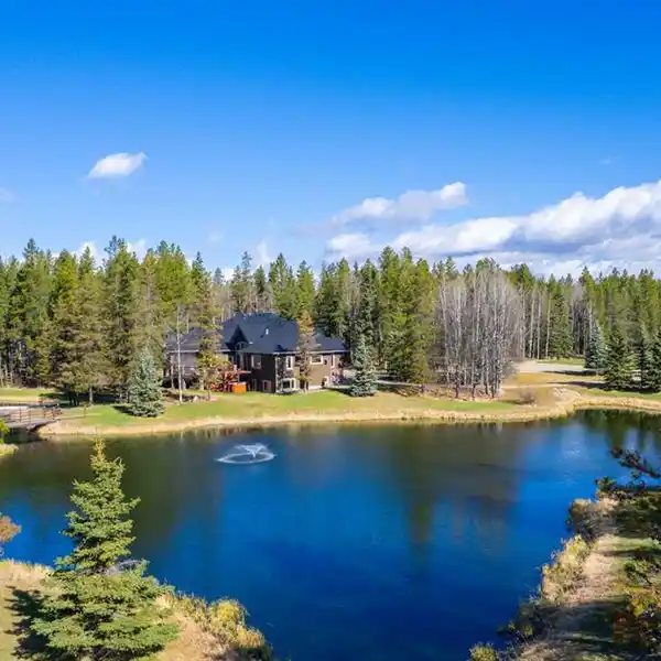 CUSTOM HOME ON 32 PARK-LIKE ACRES