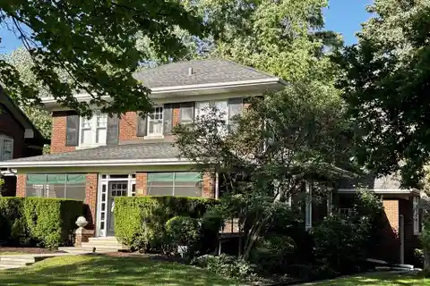 Central River Forest Home on a Stately Block