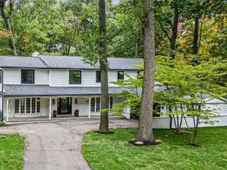 Spacious Family Home with Dual Fireplaces and Modern Kitchen