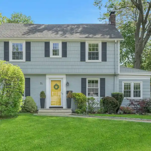 CHARMING CENTER-HALL COLONIAL WITH SPACIOUS LIVING