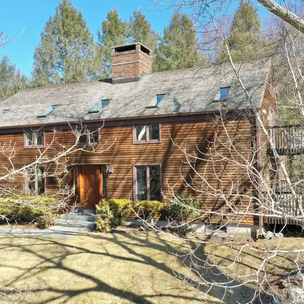 ONE-OF-A-KIND CUSTOM BUILT BARN HOME ON FIVE SECLUDED ACRES