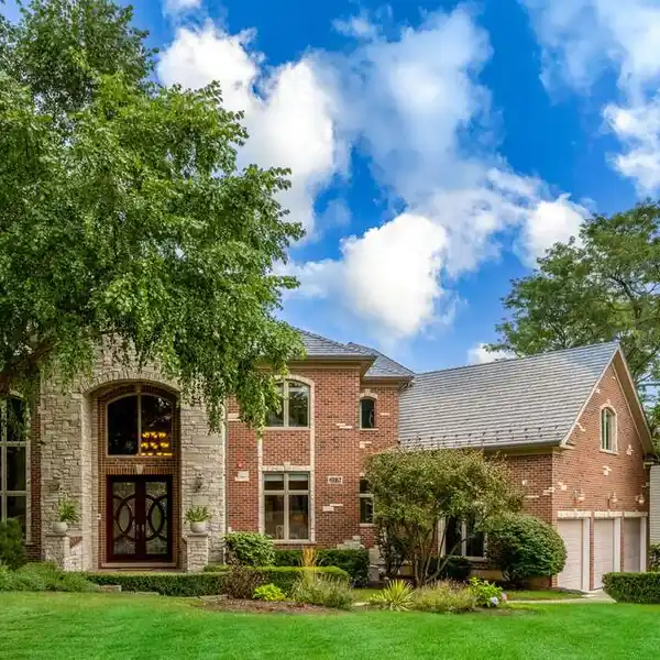 EXCEPTIONAL BRICK AND STONE RESIDENCE