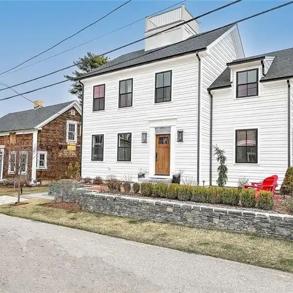 NEWLY CONSTRUCTED COASTAL HOME IN THE COVETED HILL & HARBOR