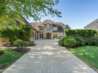 Elevated Design Meets Tranquil Waterfront Setting