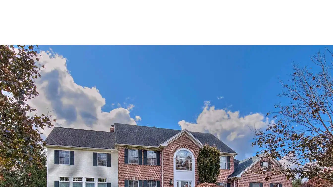 Exquisite six Bedroom Center Hall Colonial