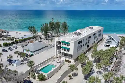 Secure Gated Condo Steps from Beach