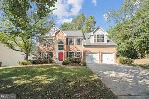 Beautifully Updated Brick-Front Colonial